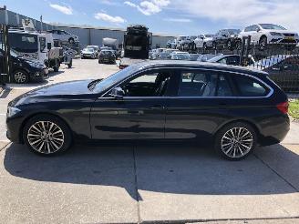uszkodzony samochody osobowe BMW 3-serie 318i touring automaat veel opties 70 dkm 2019/4